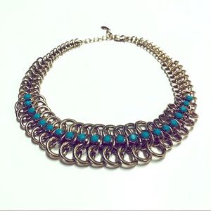 Aldo gold and turquoise necklace.